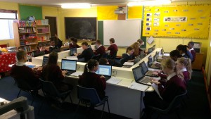 Sixth class pupils enjoying new computer room.